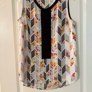 Black and Gray Sleeveless Blouse with Geometric Pattern